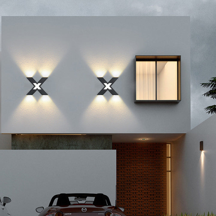 Modern waterproof LED outdoor spotlight in X-design for facade lighting