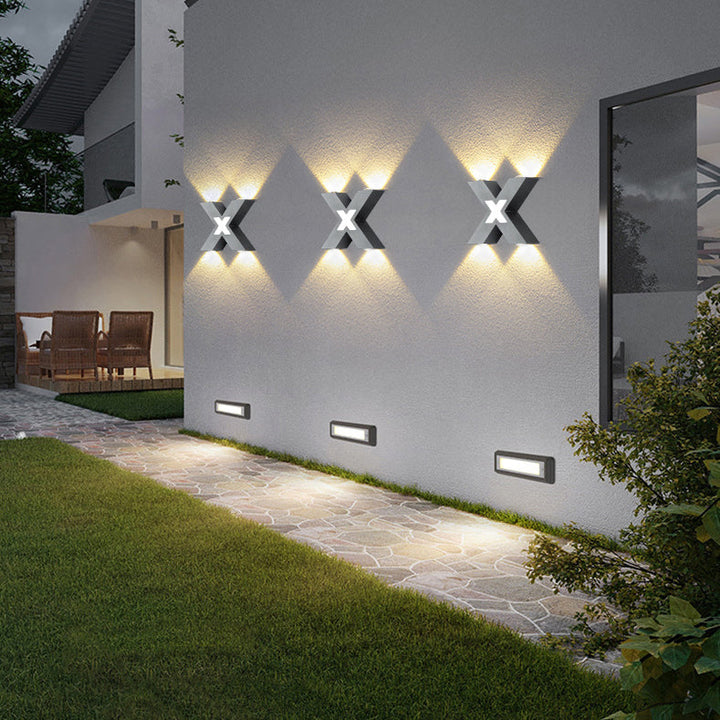Modern waterproof LED outdoor spotlight in X-design for facade lighting