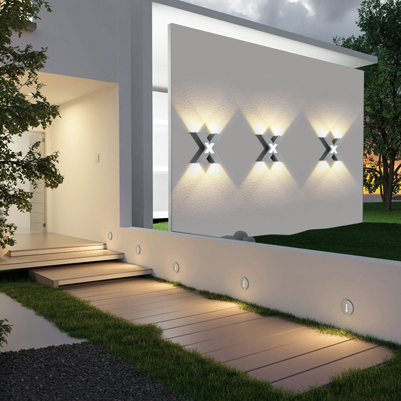 Modern waterproof LED outdoor spotlight in X-design for facade lighting