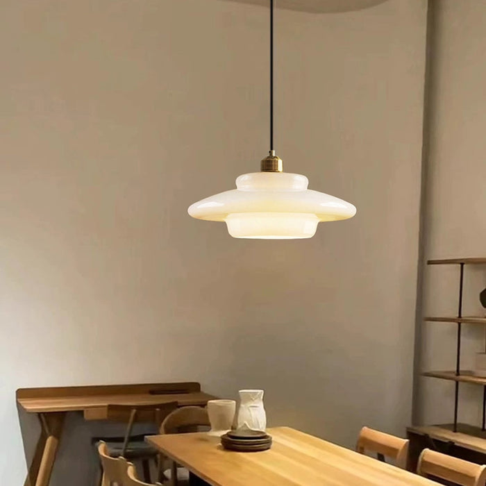 Mid-century style pendant lamp made of frosted glass with brass detail