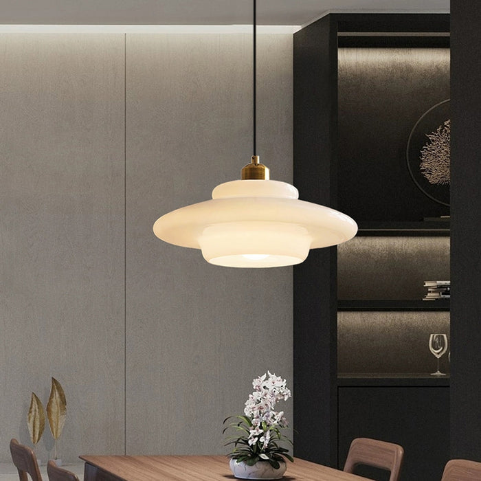 Mid-century style pendant lamp made of frosted glass with brass detail