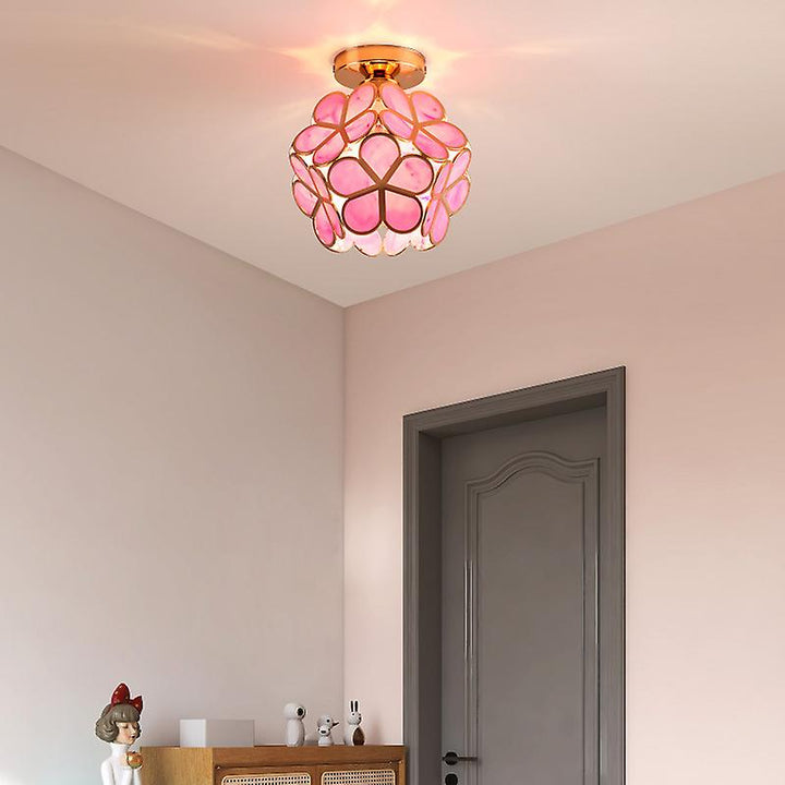 Floral glass ceiling light with light reflection