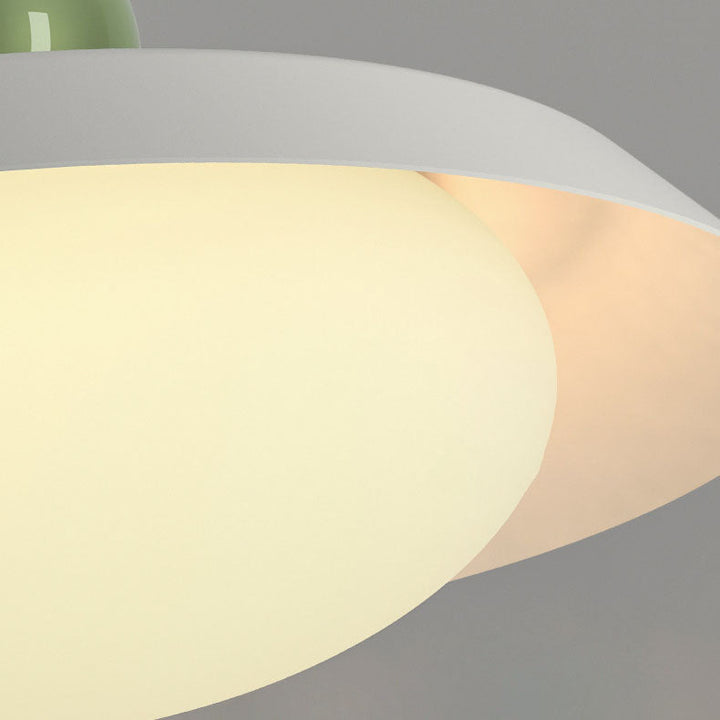 Modern pendant light made of acrylic and glass in a minimalist style