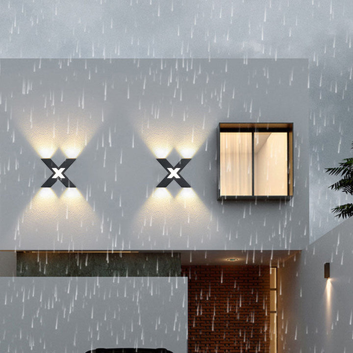 Modern waterproof LED outdoor spotlight in X-design for facade lighting