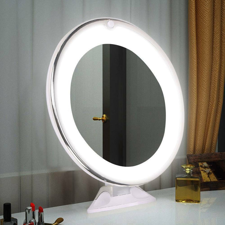 Compact LED cosmetic mirror with 10x magnification and 360° rotation