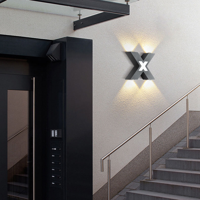 Modern waterproof LED outdoor spotlight in X-design for facade lighting