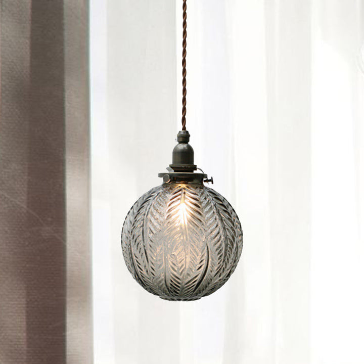 Pendant lamp with glass and feather motif – clear or smoked glass