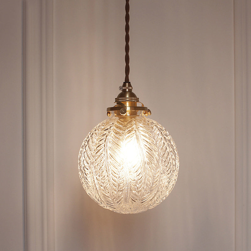 Pendant lamp with glass and feather motif – clear or smoked glass