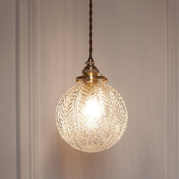 Pendant lamp with glass and feather motif – clear or smoked glass