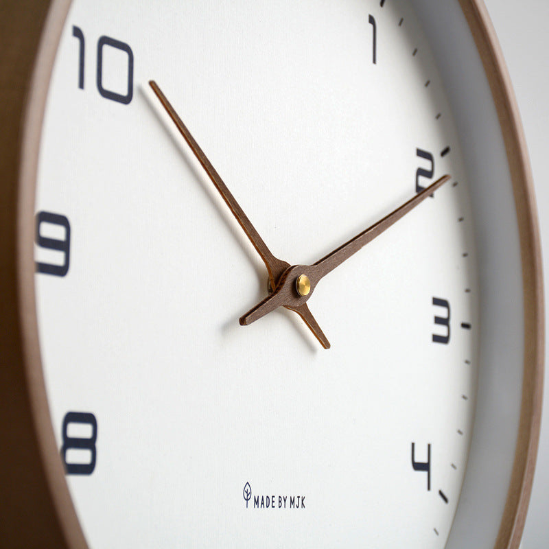 Silent wooden wall clock with a timeless design