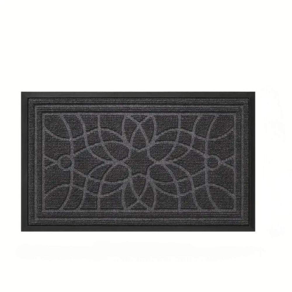 Doormat with geometric floral pattern and non-slip backing 