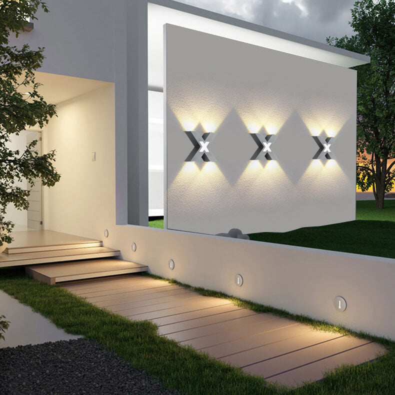 Modern waterproof LED outdoor spotlight in X-design for facade lighting