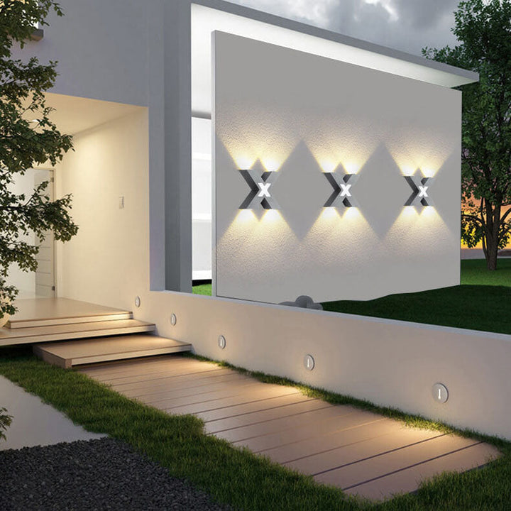 Modern waterproof LED outdoor spotlight in X-design for facade lighting