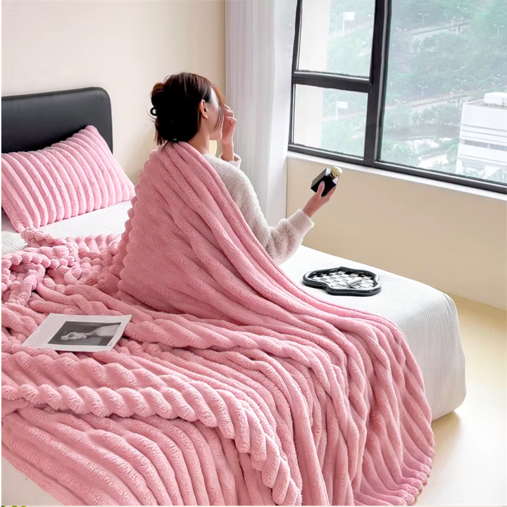 Fleece cuddly blanket with ribbed design