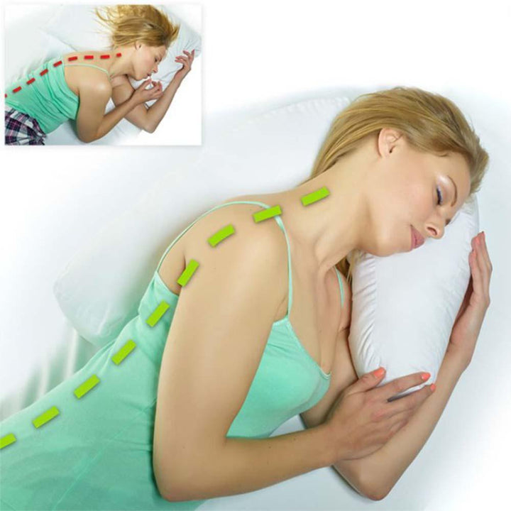 Side sleeper pillow with ear recess