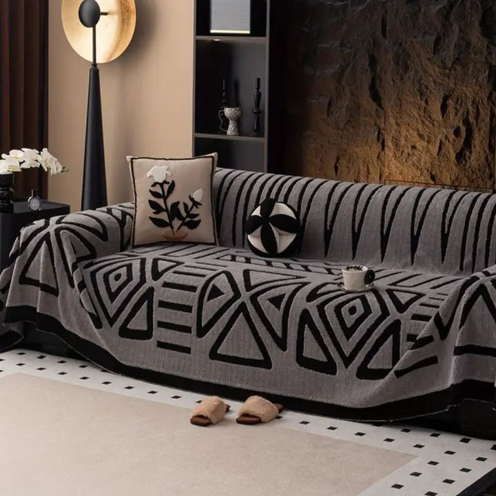 Sofa cover with labyrinth pattern – velour throw for modern protection