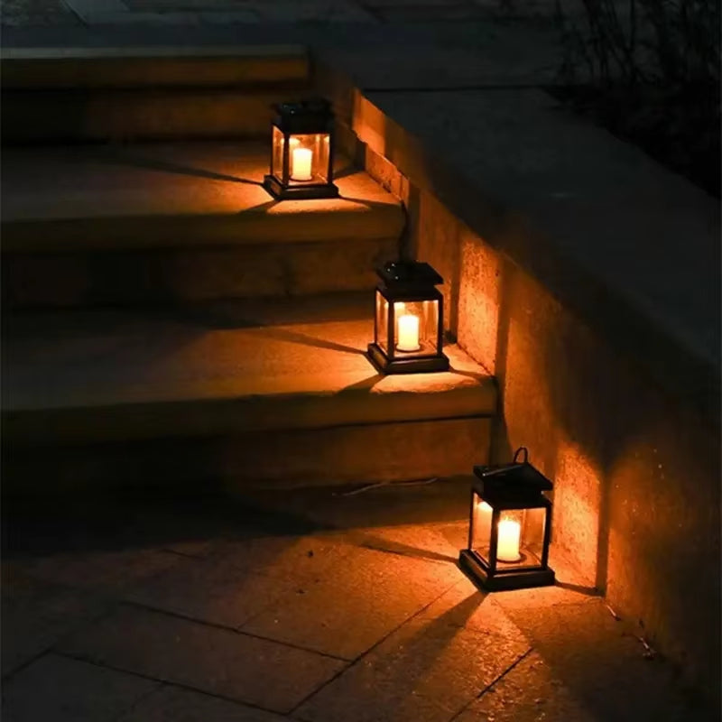Solar-powered retro garden lantern with LED candle light for atmospheric nights