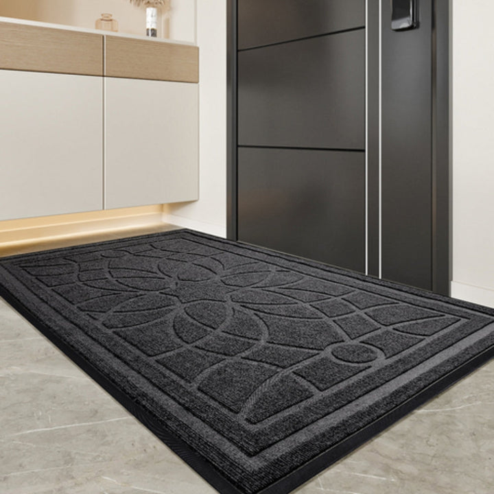Doormat with geometric floral pattern and non-slip backing 