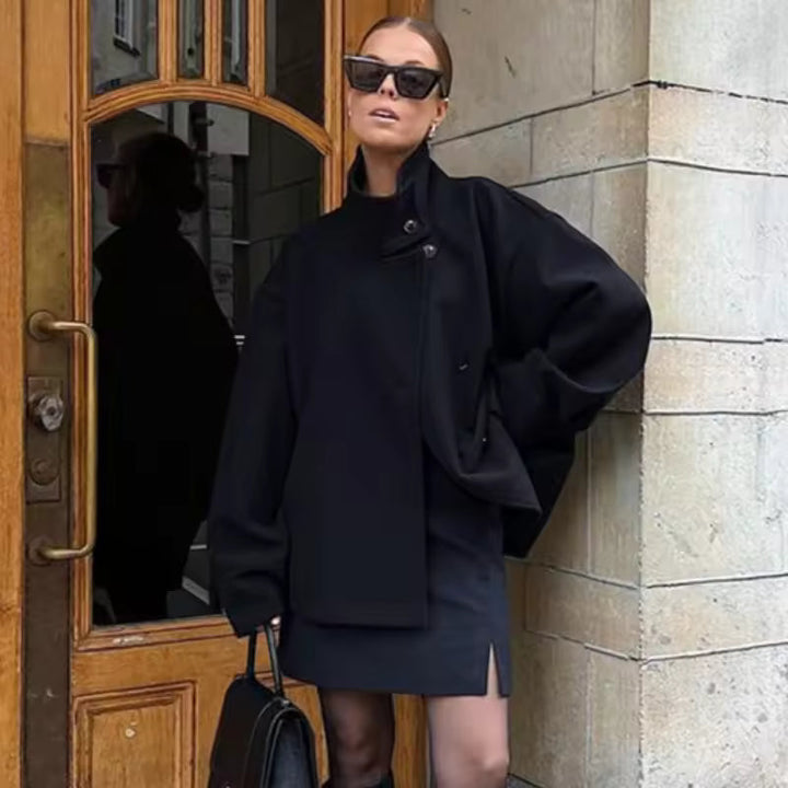 Women's short jacket with high collar and asymmetrical button placket 