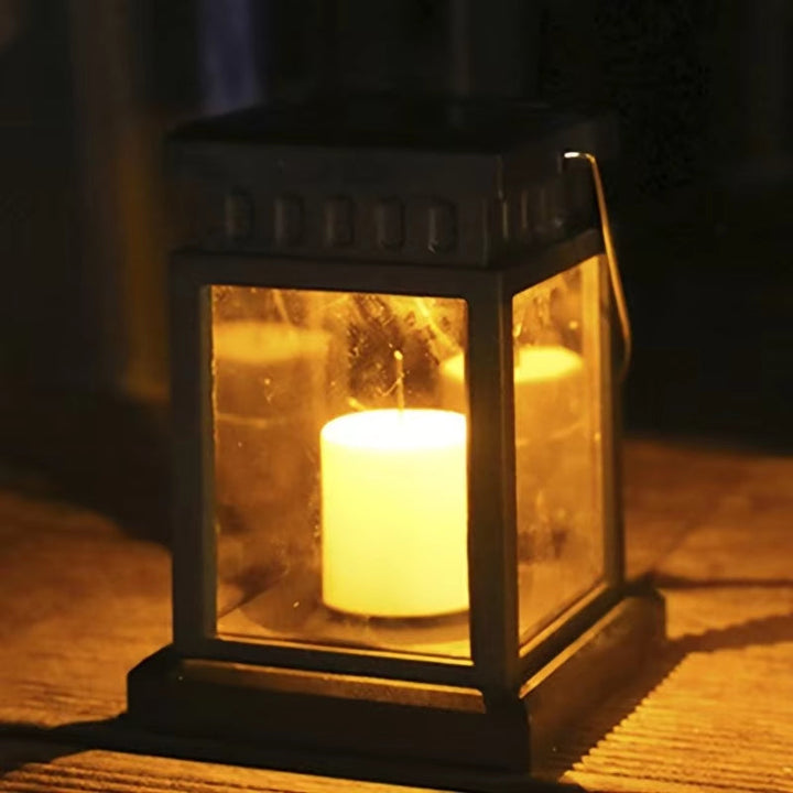 Solar-powered retro garden lantern with LED candle light for atmospheric nights