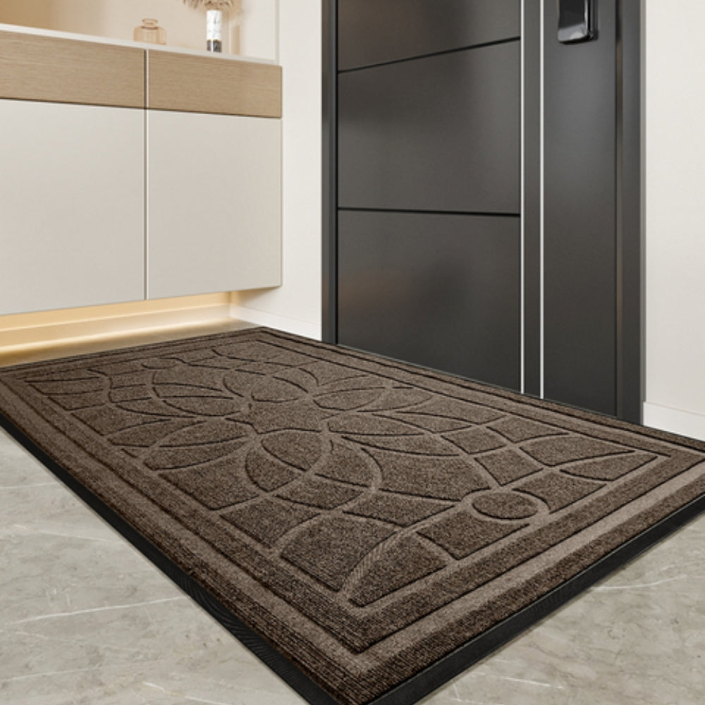 Doormat with geometric floral pattern and non-slip backing 