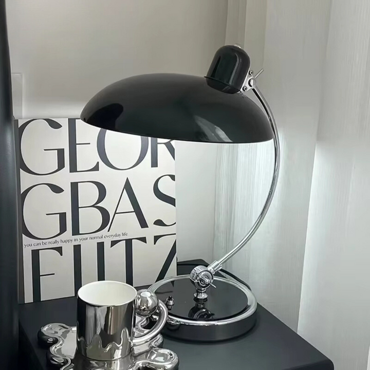 Table lamp with elegant iron arch