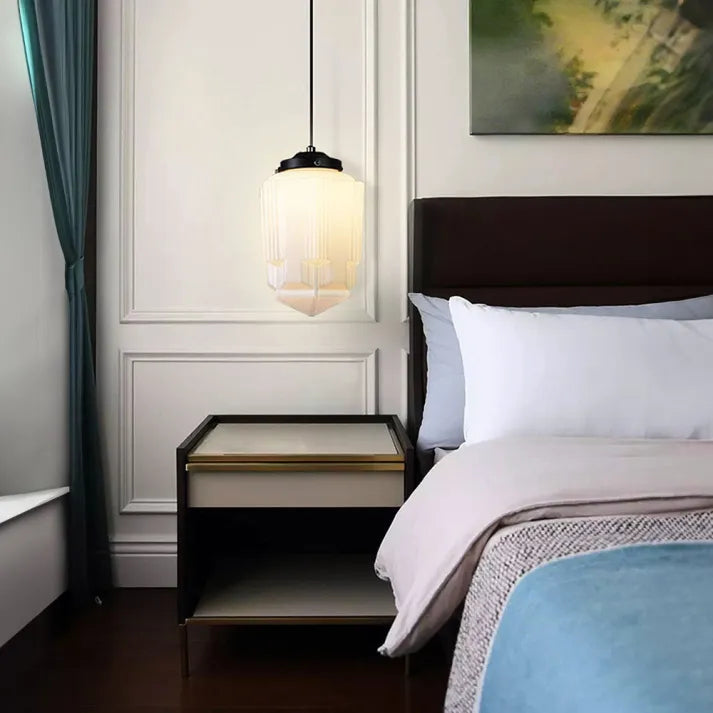 Pendant lamp made of white frosted glass in a geometric design