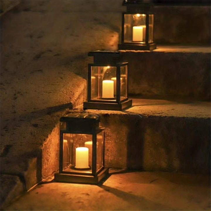 Solar-powered retro garden lantern with LED candle light for atmospheric nights