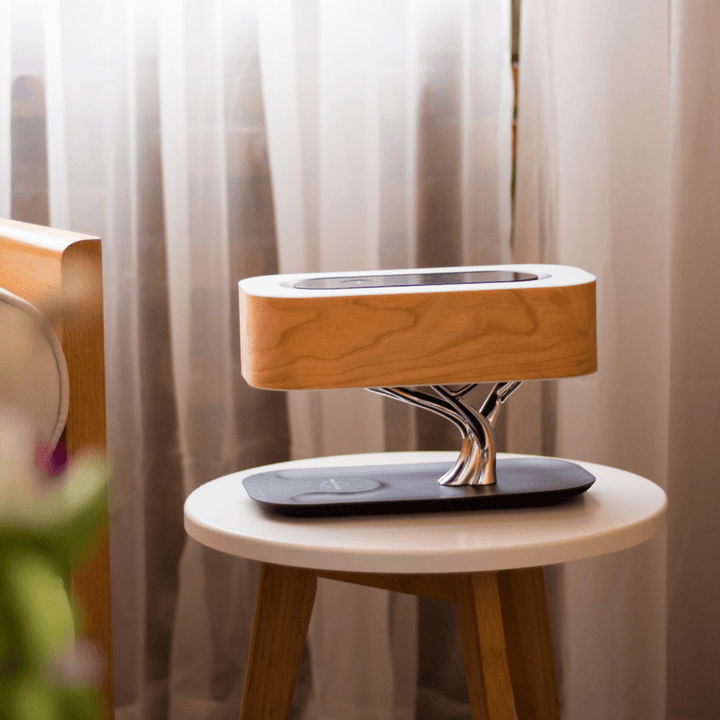 Designer LED table lamp with wood look, Bluetooth speaker and wireless charging function