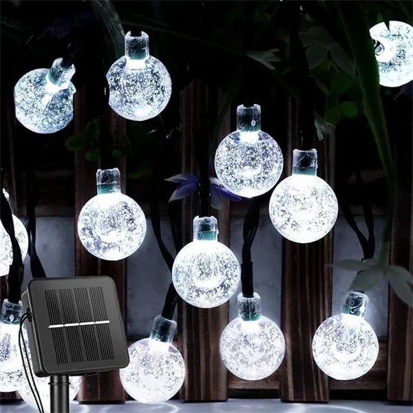 Weatherproof solar-powered LED string lights for patio and balcony