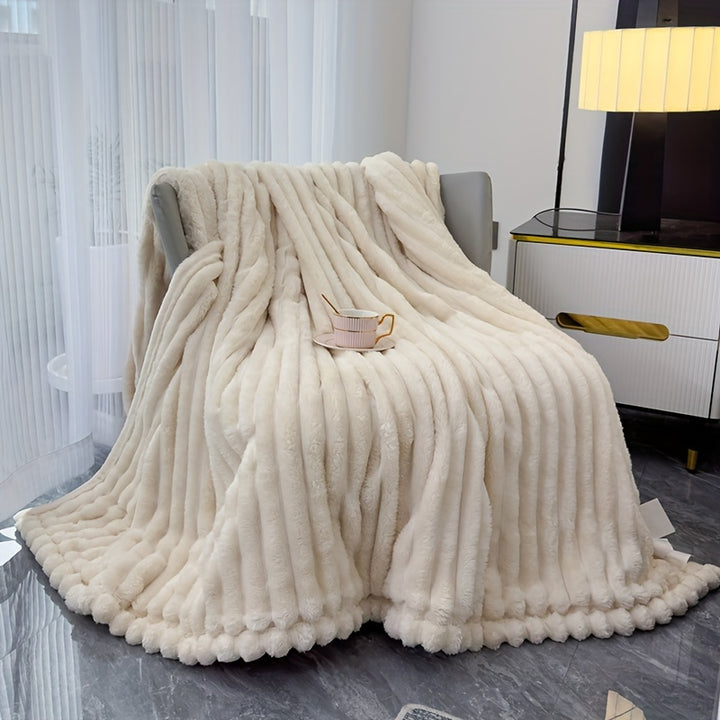 Sofa blanket with plush look