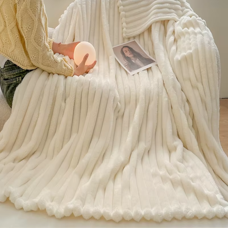 Fleece cuddly blanket with ribbed design