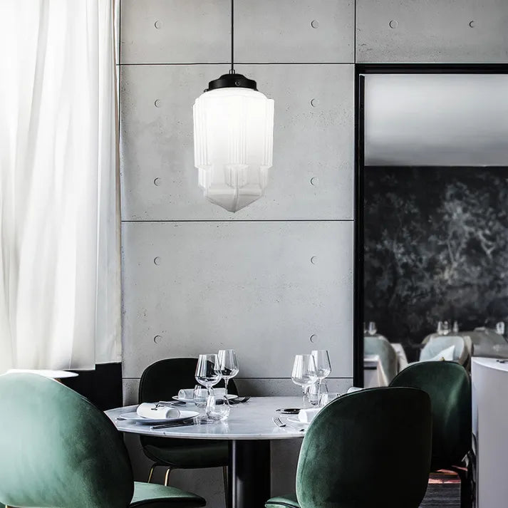 Pendant lamp made of white frosted glass in a geometric design