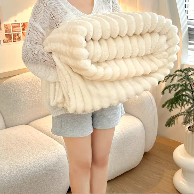 Fleece cuddly blanket with ribbed design
