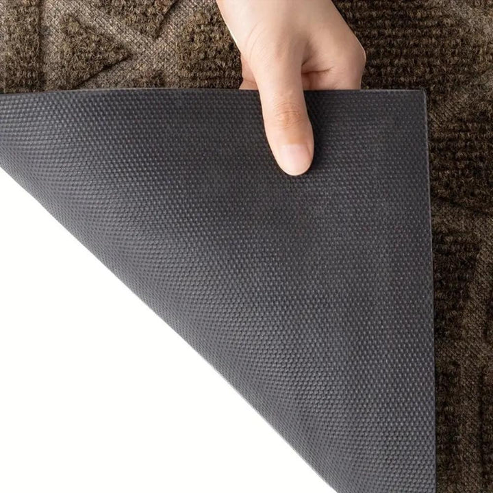 Doormat with geometric floral pattern and non-slip backing 