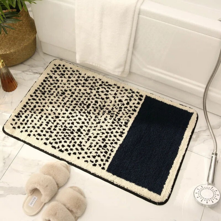 Non-slip bath mat with a modern abstract design 