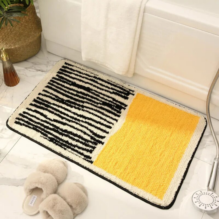 Non-slip bath mat with a modern abstract design 