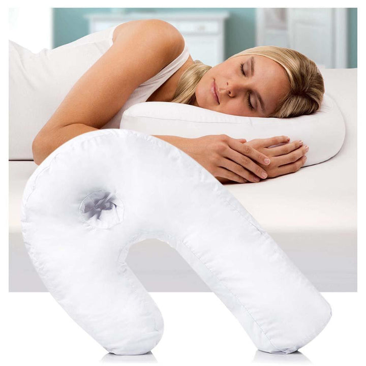 Side sleeper pillow with ear recess