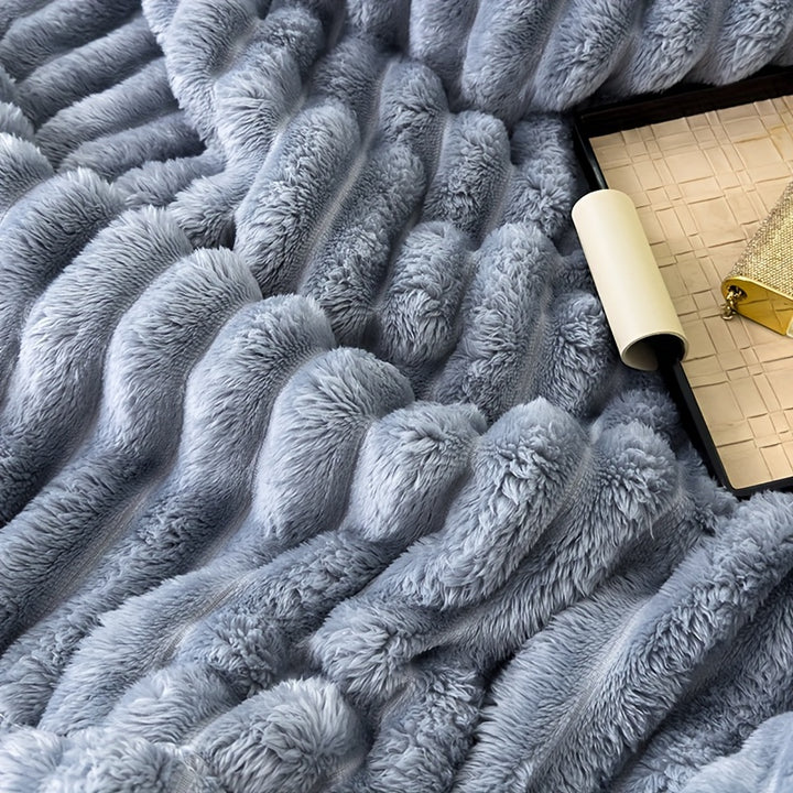 Sofa blanket with plush look