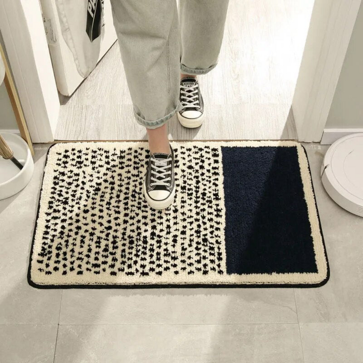 Non-slip bath mat with a modern abstract design 