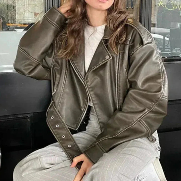 Women's short jacket with belt and tailored cut