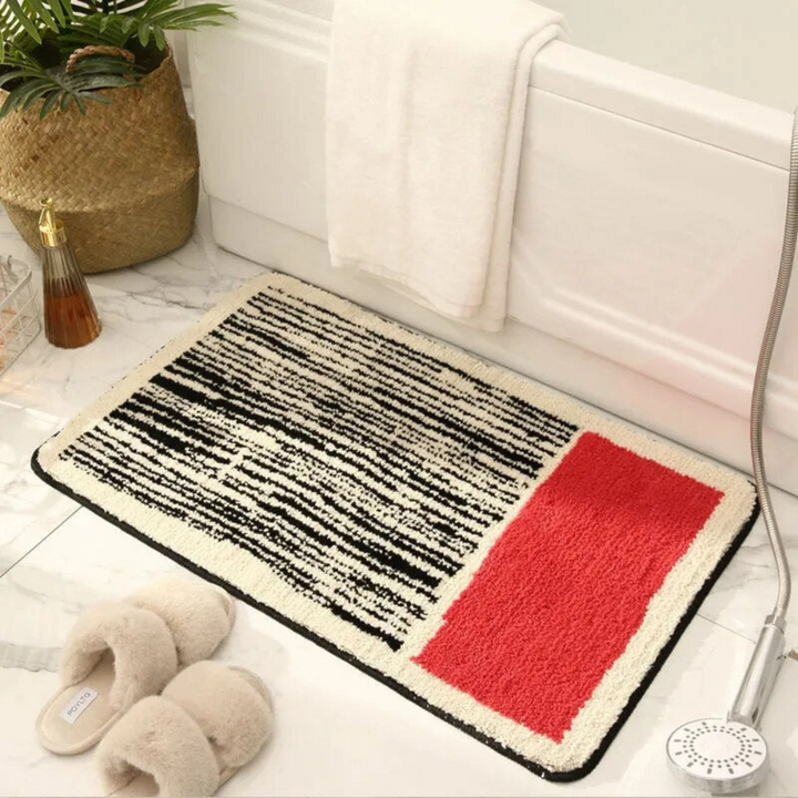 Non-slip bath mat with a modern abstract design 