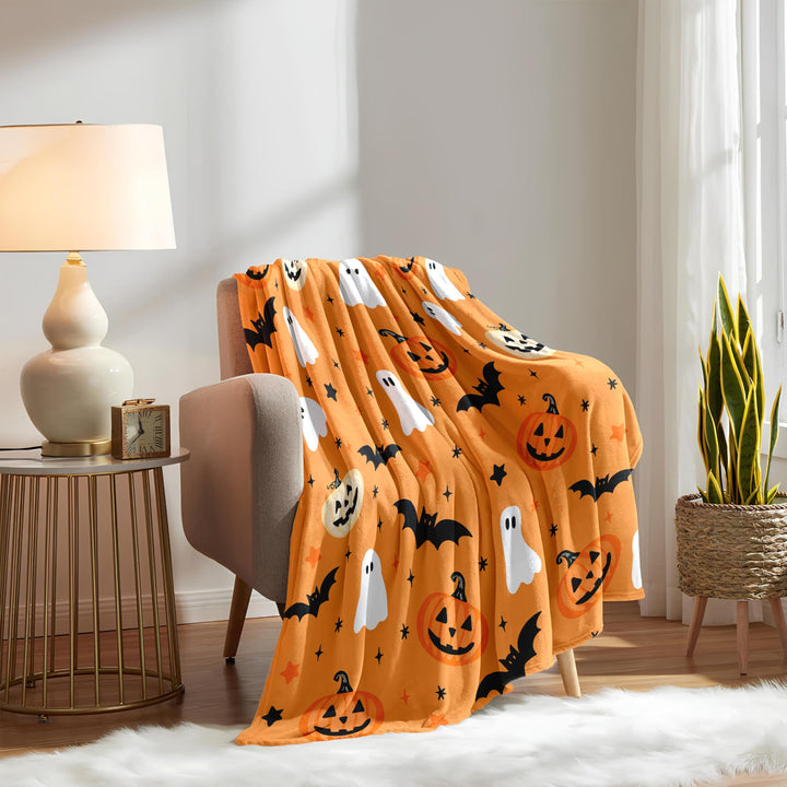 Orange Wohndecke mit saisonalem Halloween-Muster