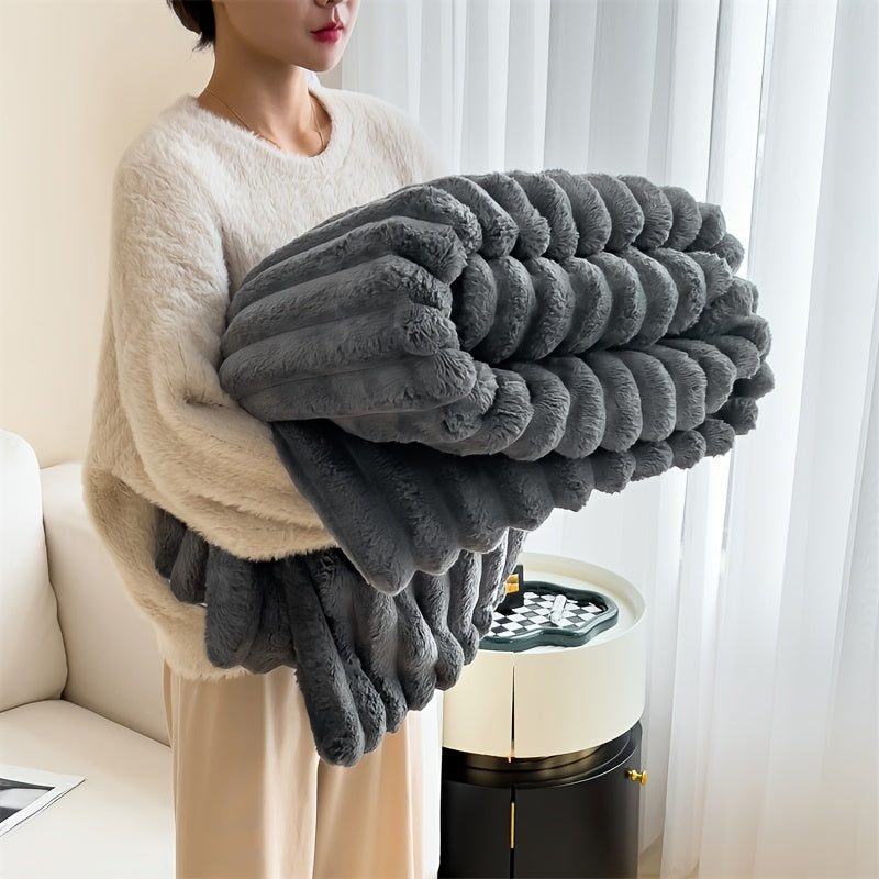 Sofa blanket with plush look