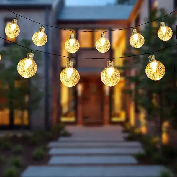Weatherproof solar-powered LED string lights for patio and balcony