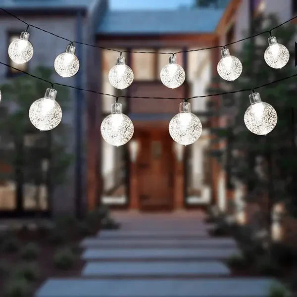 Weatherproof solar-powered LED string lights for patio and balcony