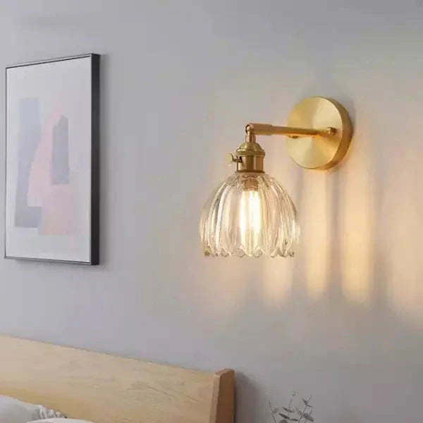 Wall lamp with tulip-shaped glass shade in retro style