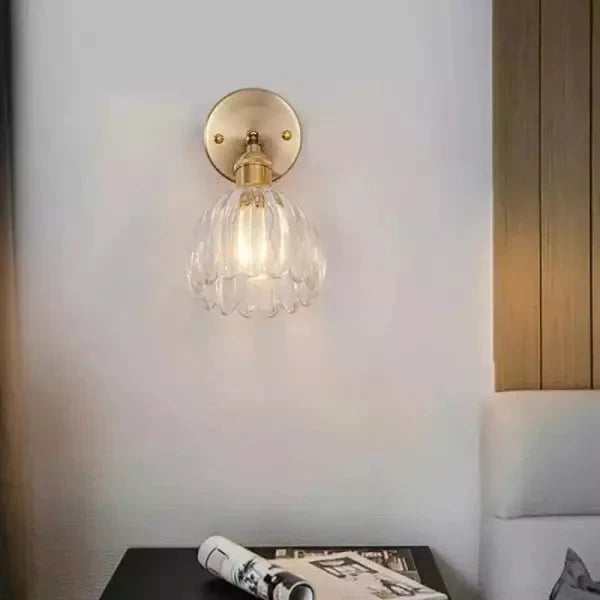 Wall lamp with tulip-shaped glass shade in retro style