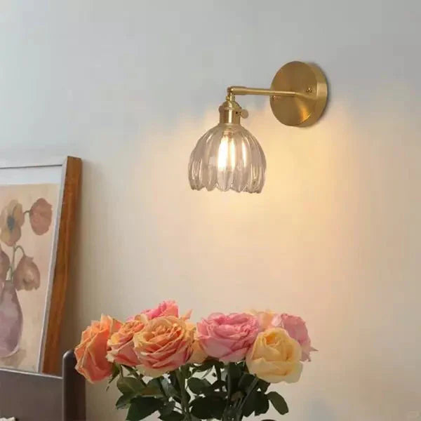 Wall lamp with tulip-shaped glass shade in retro style