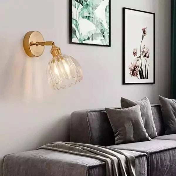Wall lamp with tulip-shaped glass shade in retro style